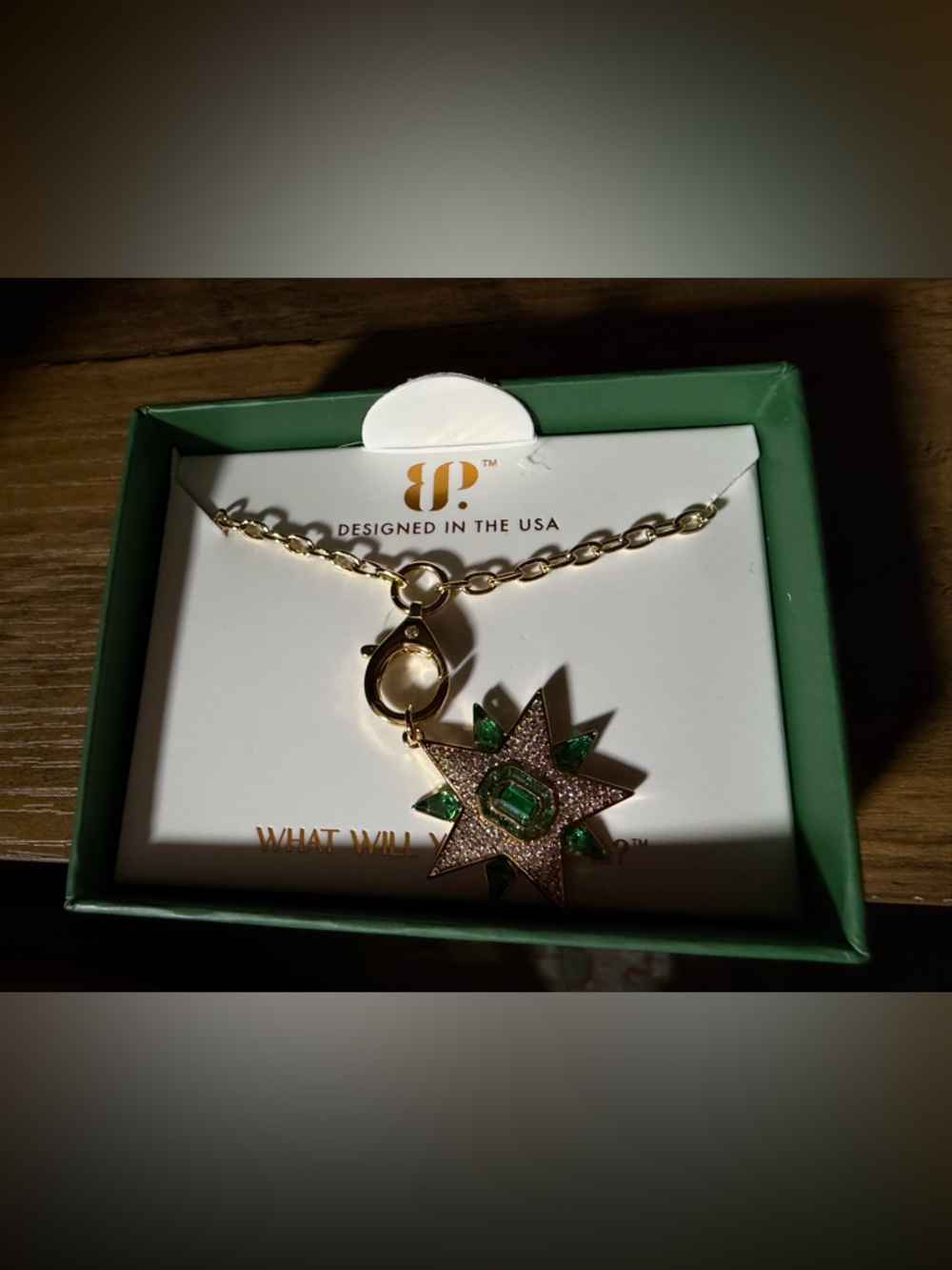 May 2026 Gold Starburst Pendant Necklace with Emerald Green Stones